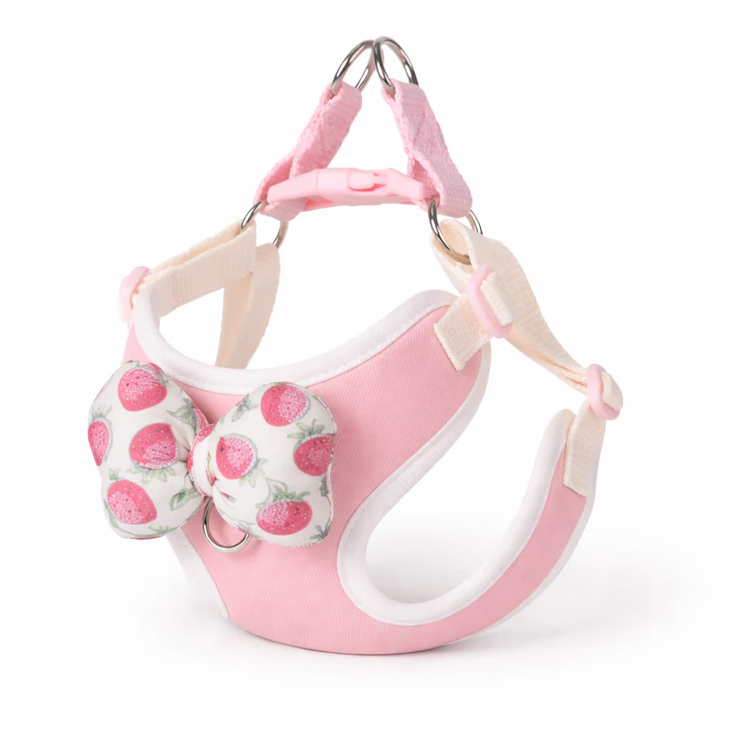 Pink bow harness with adjustable straps and padded trim for small dogs